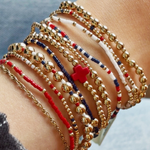 Signature Cross Gold Pattern 2mm Bead Bracelet | Firecracker